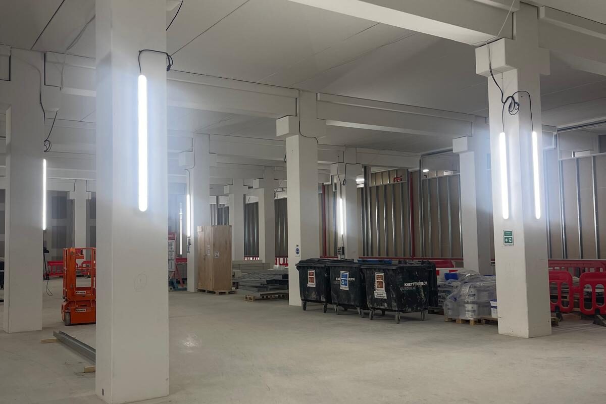 Temporary site lighting across an empty building level