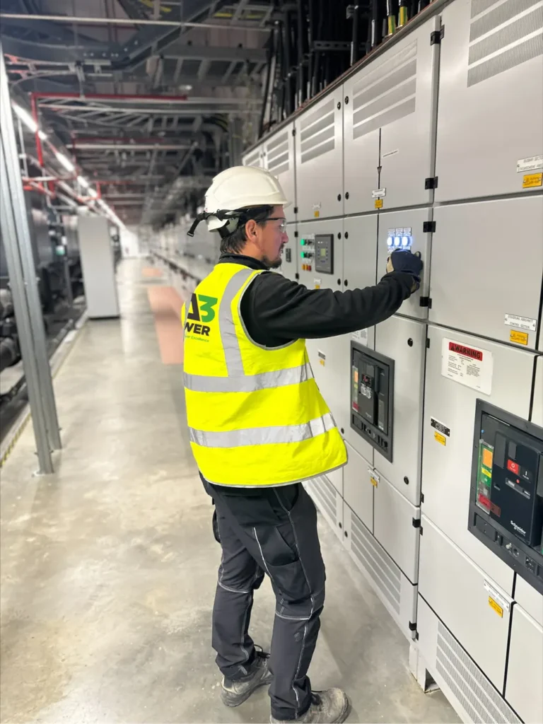 SA3 Power engineer energising LV switchgear during commissioning