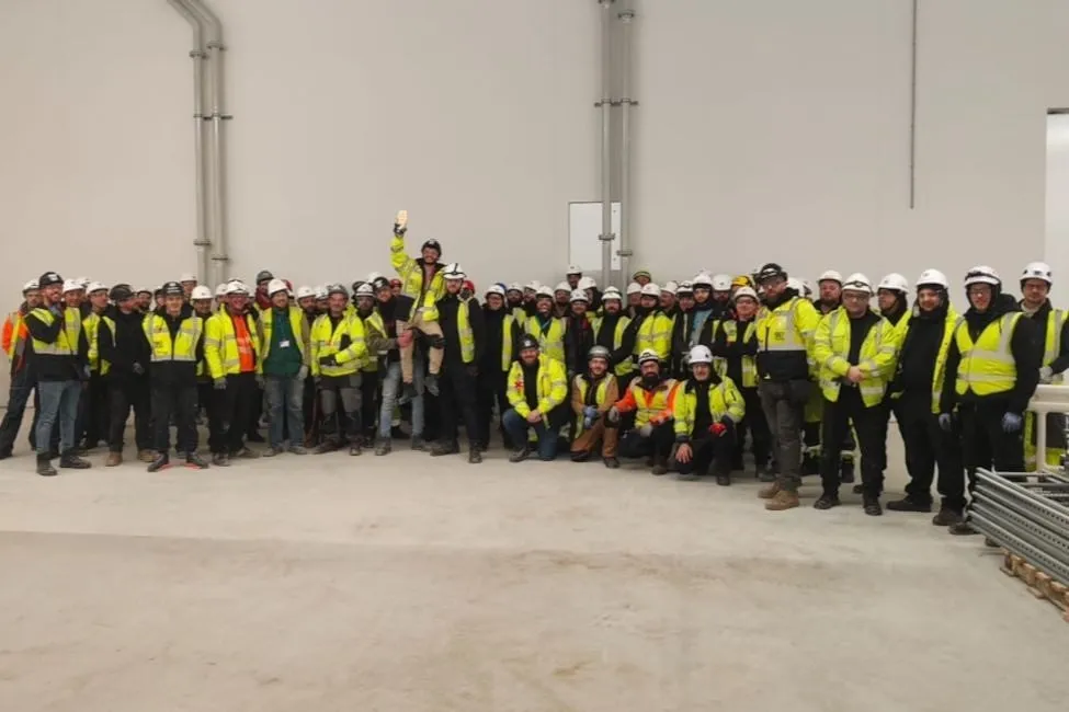 Large SA3 Power site team in hi-vis on a construction project