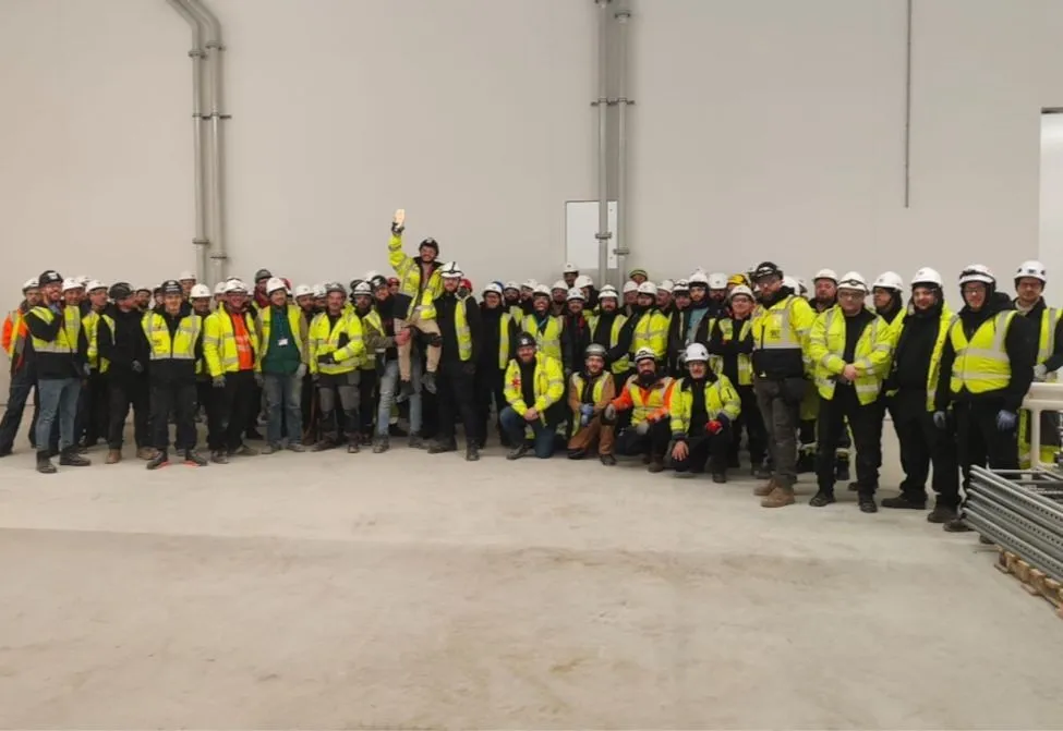 Large SA3 Power site team in hi-vis on a construction project