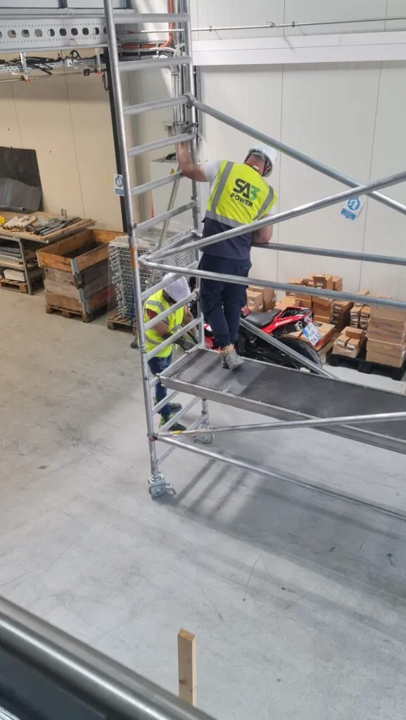 SA3 POWER operatives assembling a mobile access tower platform during working at height training