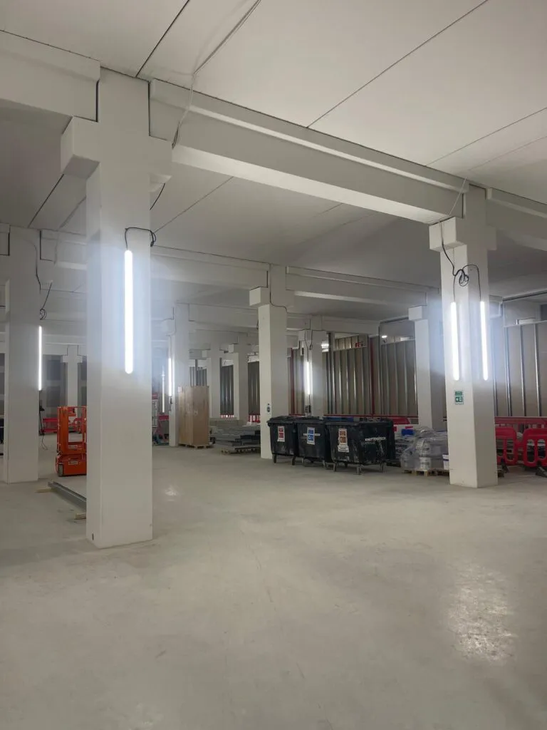 Temporary site lighting across an empty building level