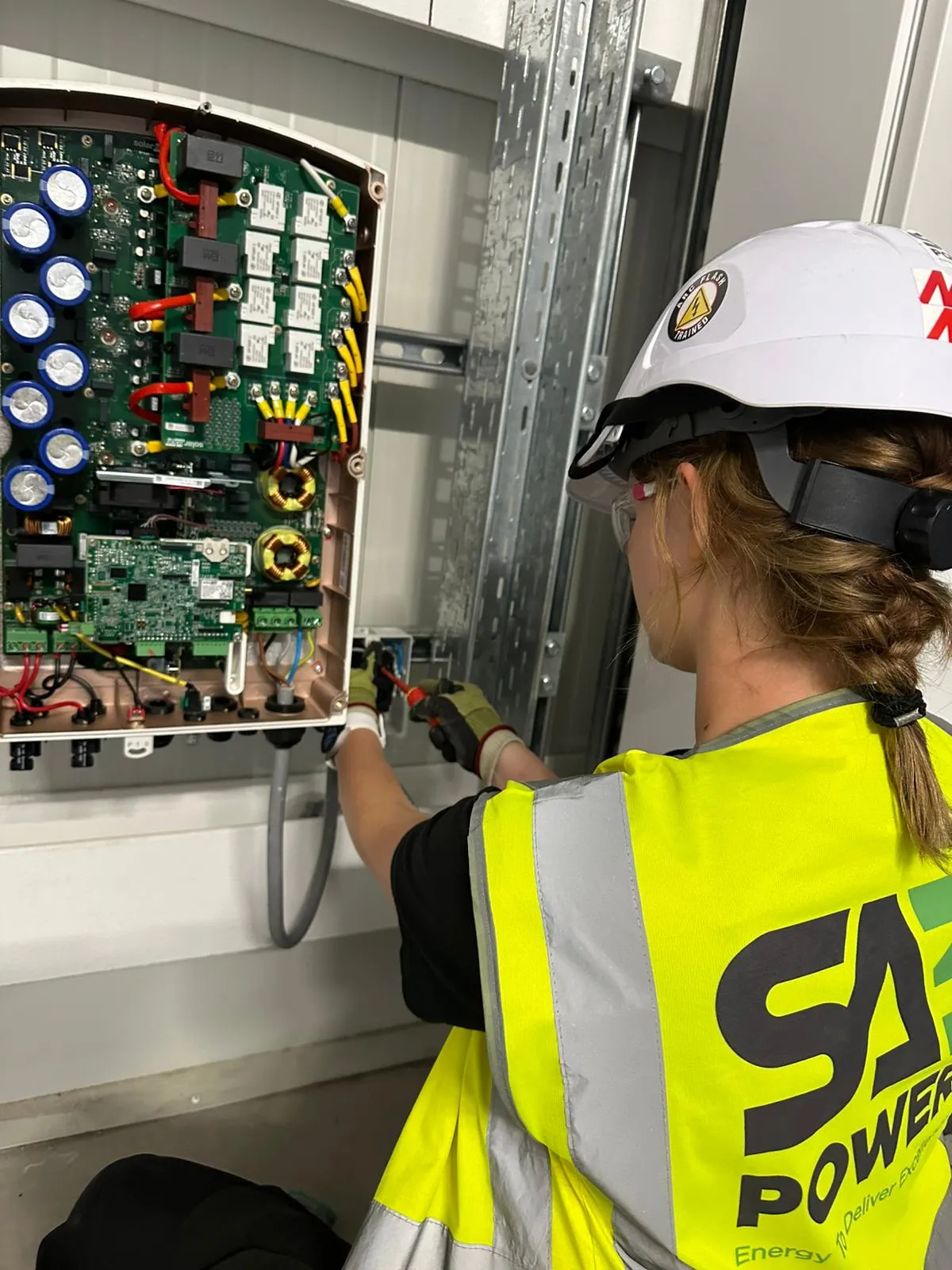 SA3 Power electrician fault-finding inside a control panel