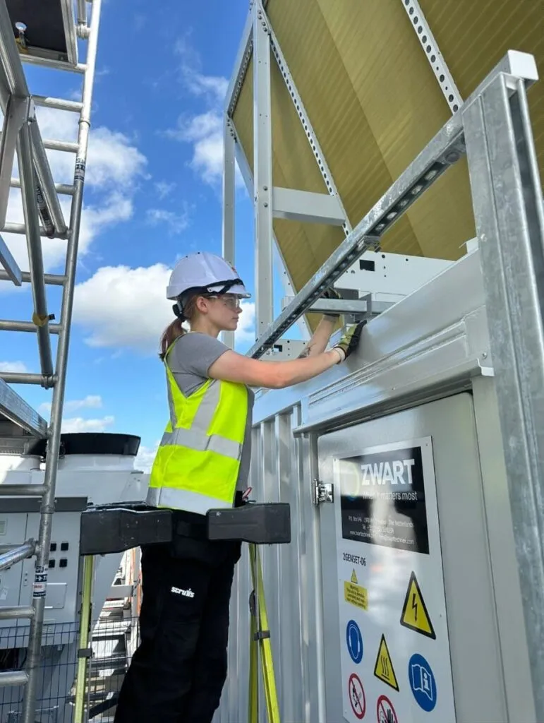 SA3 Power electrician working safely from a platform on site