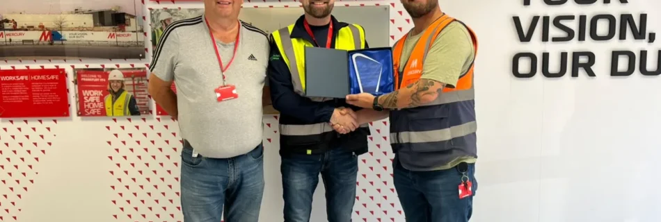 Paul Haigh, EHS Manager, and David (Dee) Henry, Construction Manager, collecting the Safety Contractor of the Month award for SA3 POWER
