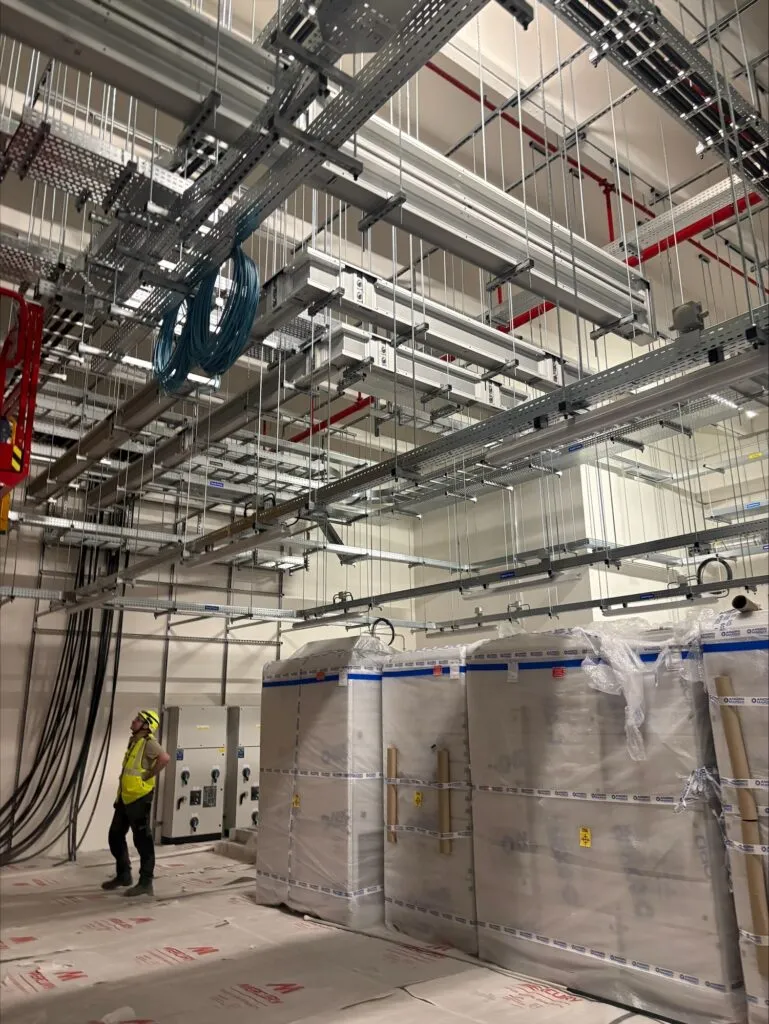 Multi-tier cable containment and busbar installed by SA3 POWER in a data hall